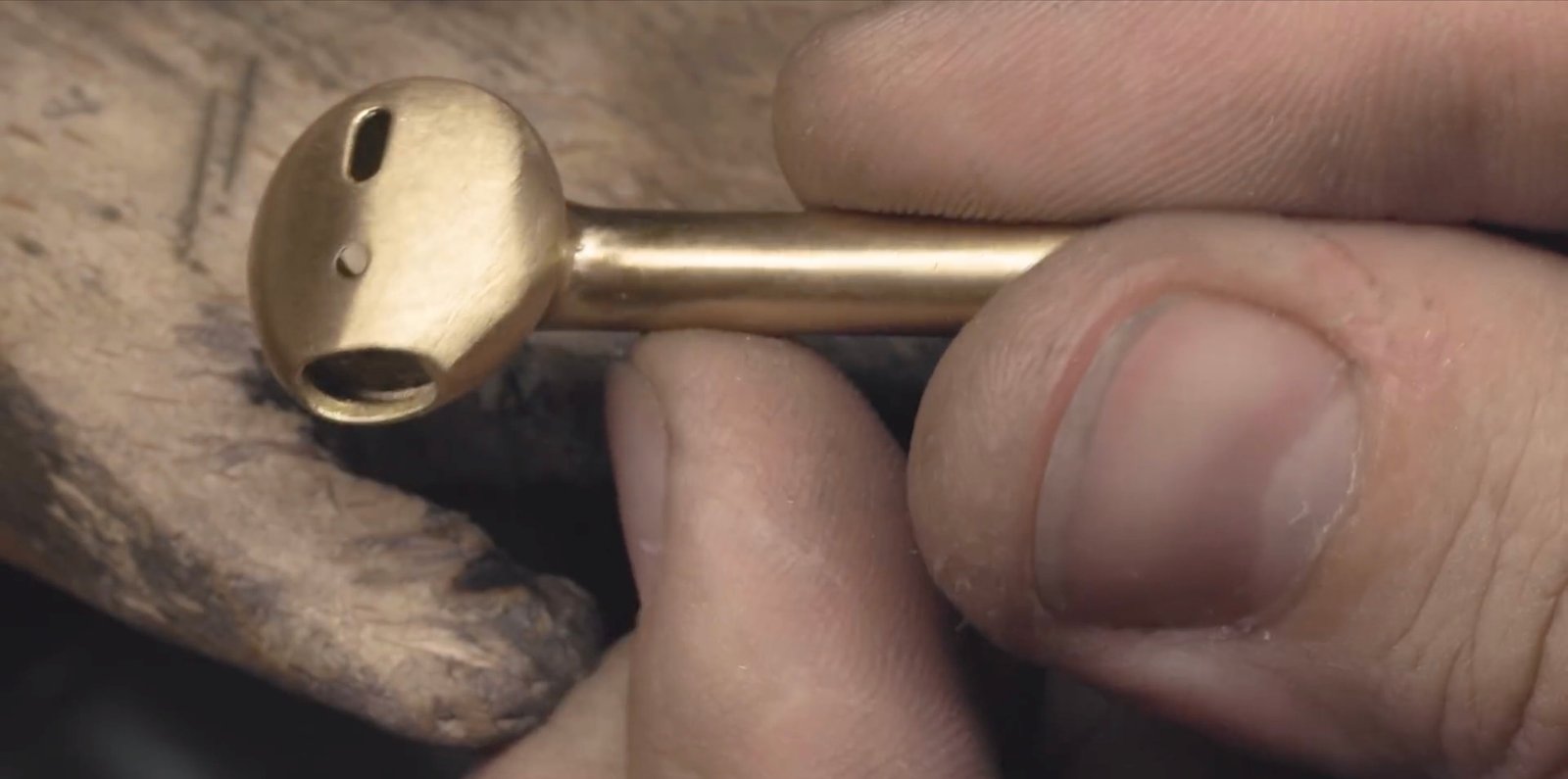 Photo of Watch an expert jeweler transform his AirPods into an 18-karat gold AirGolds [video]
